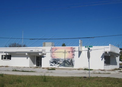 cross mural on building