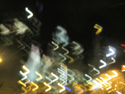 city lights in moving car